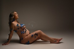 zwangerschapsfotografie met vlinders als symbool